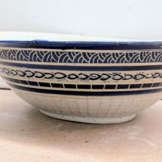 Blue and white sgraffito bowl